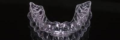 Tray of clear aligners at Invisalign dentist in Flowery Branch